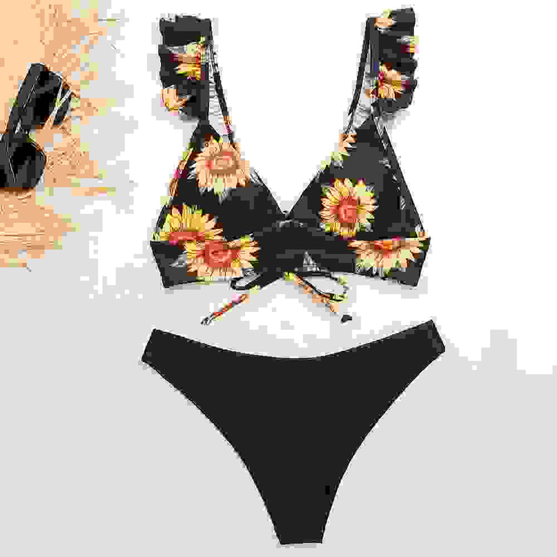 Black sunflower print padded bikini set with ruffled straps. Stylish bandage bathing suit for women’s summer swimwear.