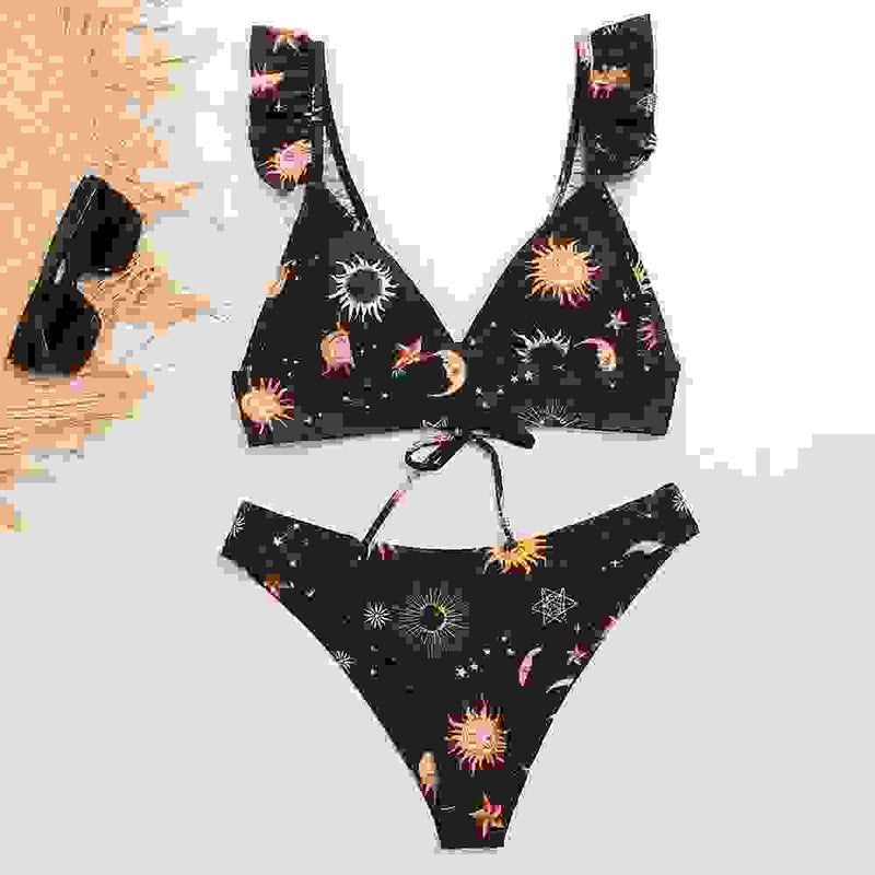 Black bikini set with colorful celestial print and ruffled straps. Sexy padded biquini bathers for women’s swimwear.