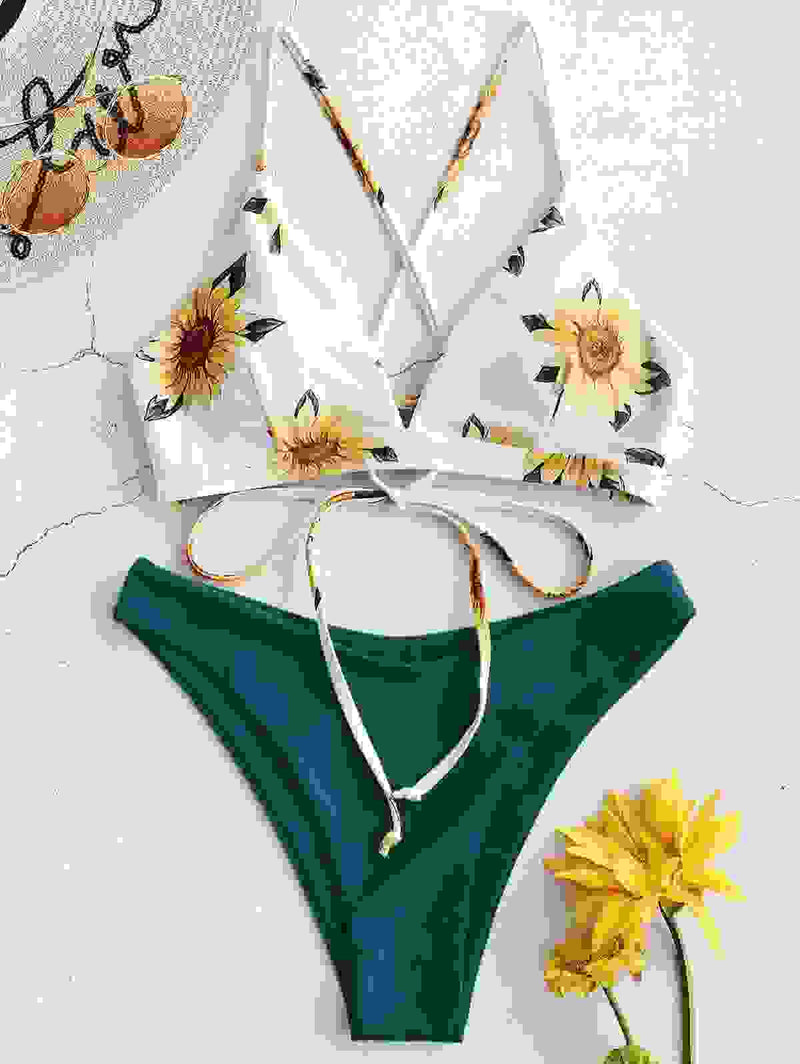 Sunflower bikini top with dark green padded bikini bottom. Stylish bandage bathing suit for women’s beachwear.