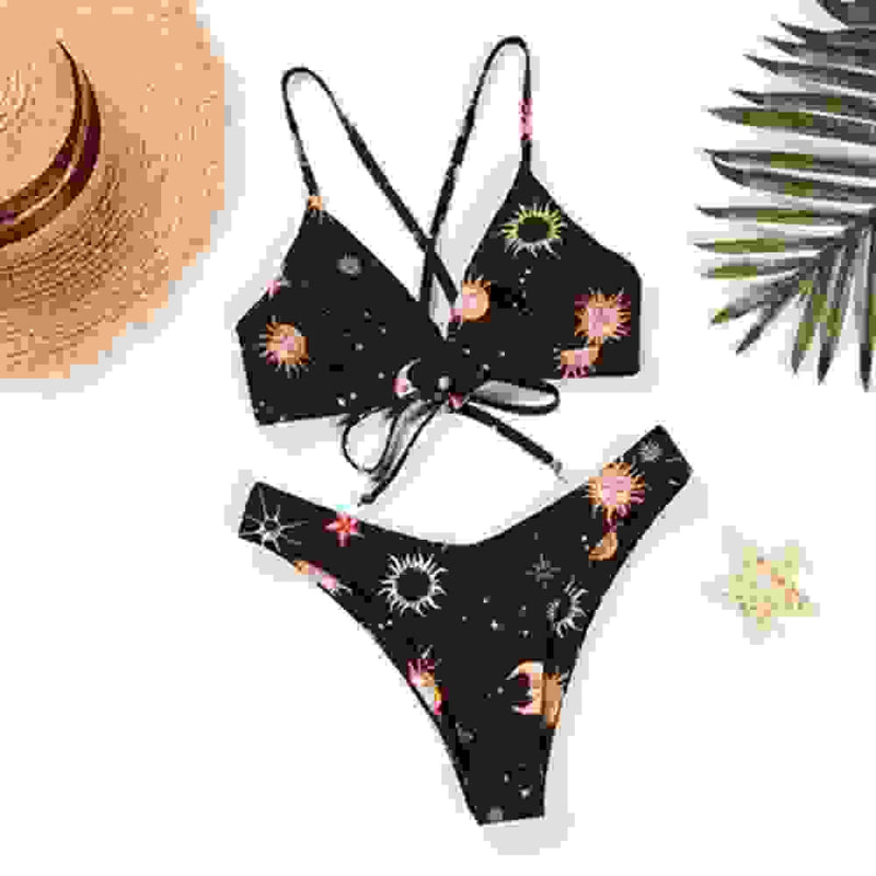 Black celestial print bikini set with sun and moon design. Stylish padded biquini bathers for women’s swimwear.