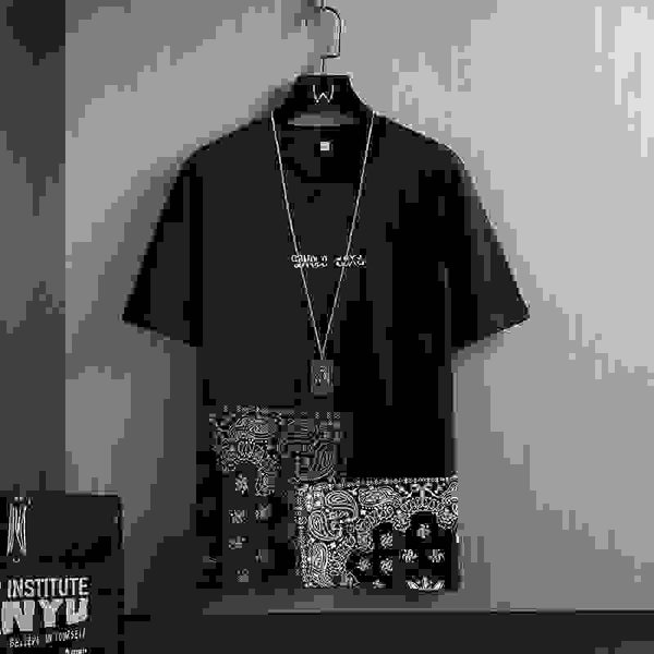 Men's T-Shirts - Geometric Print | Short Sleeve, Round Neck in black with white paisley block print and necklace accessory, youth streetwear style.